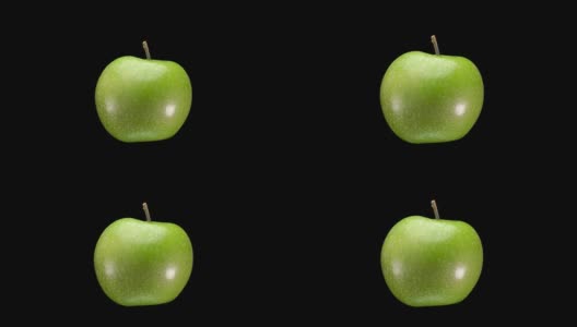 美丽的，绿色的苹果在黑色的背景上，特写高清在线视频素材下载