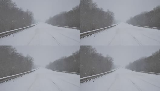 轨道道路，汽车骑冬天是非常沉重的雪，汽车暴风雪，暴风雪俄罗斯户外高清在线视频素材下载