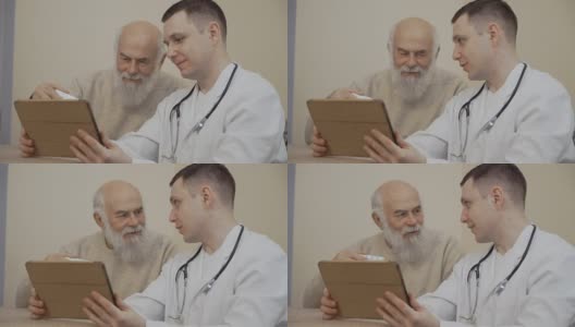 老男人拿着一盘药丸问医生与数字平板高清在线视频素材下载