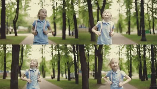 一个穿着短裤的可爱女孩正在公园里蹦蹦跳跳。高清在线视频素材下载