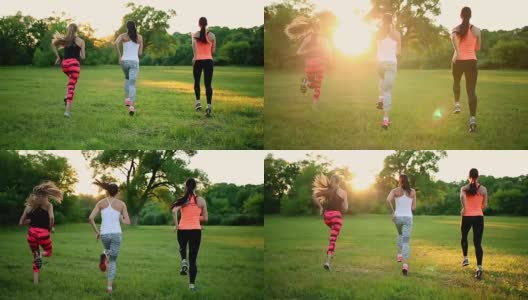 一群健康的女孩在户外跑步在日落与镜头光晕高清在线视频素材下载