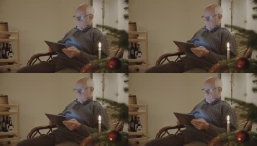 平板电脑高级圣诞网上购物搜索冲浪男人男性互联网高清在线视频素材下载