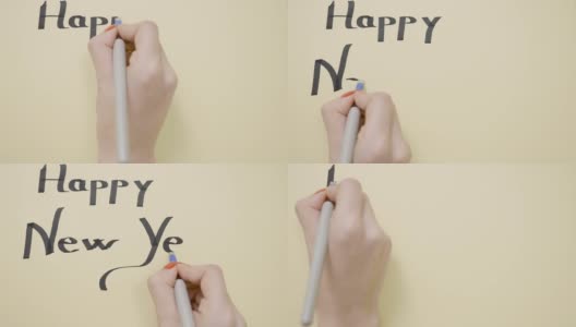女人在贺卡上写着新年祝福，并用粗笔在上面划了下划线高清在线视频素材下载