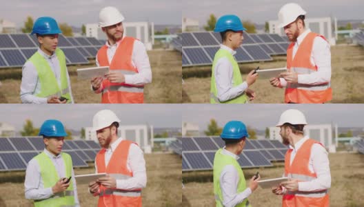 自然环境概念近距离拍摄一位亚洲工业机械师和生态工程师戴着安全帽用数码平板电脑控制光伏电池高清在线视频素材下载