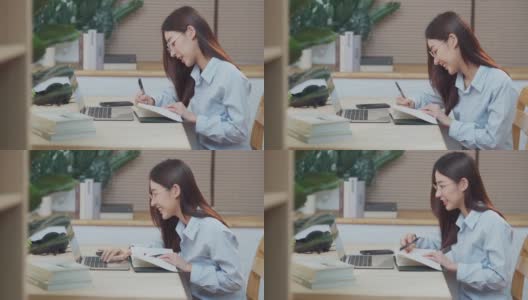 亚洲商业女性作为自由职业者使用电脑笔记本电脑从家里工作高清在线视频素材下载