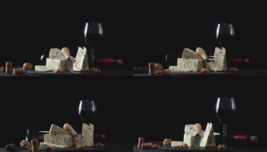 布里奶酪配一杯红酒慢慢旋转。高清在线视频素材下载