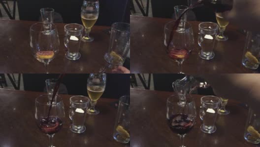 将红酒倒入加柠檬的玻璃杯中高清在线视频素材下载