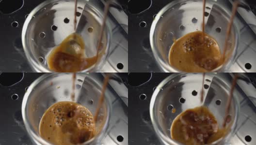 Coffee machine filling a cup with hot  coffee , slow motion高清在线视频素材下载