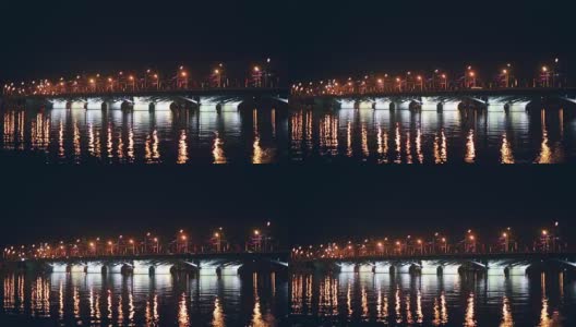 沃罗涅日，夜间照明的切尔纳夫斯基桥和水中灯光的反射高清在线视频素材下载