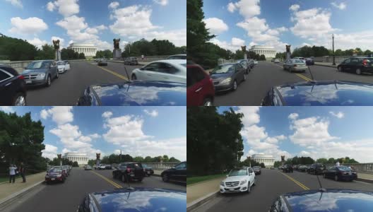 在阿灵顿纪念桥上逆向行驶高清在线视频素材下载