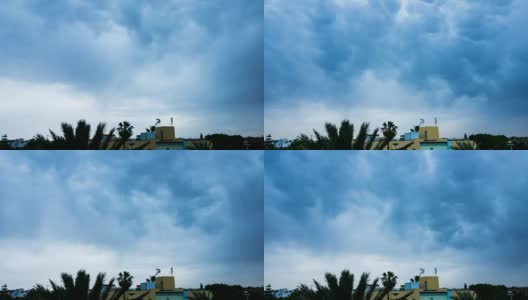 暴风雨前的乌云笼罩着屋顶。雷暴前的乌云背景。时间流逝。间隔拍摄。高清在线视频素材下载