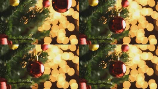 在圣诞树上装饰红球高清在线视频素材下载