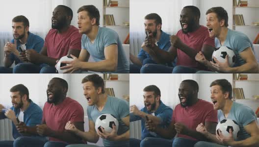 朋友们在观看足球比赛的决赛，进球后爆发出哄堂大笑高清在线视频素材下载
