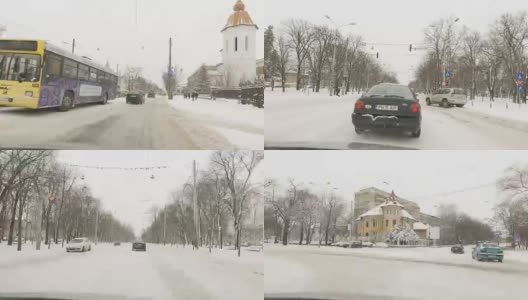 冬天的天气就在汽车路上——飘落的雪花高清在线视频素材下载