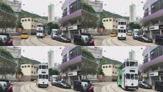 香港市景-有轨电车在筲箕湾转角处高清在线视频素材下载