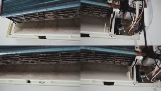 拆卸后的空调器内部的风扇、散热器上有灰尘和霉菌高清在线视频素材下载