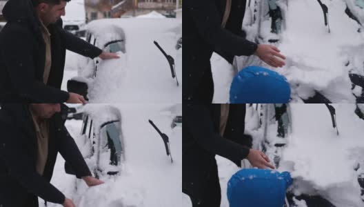 一家人在冬天清除汽车上的雪高清在线视频素材下载