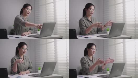 亚洲女商人在笔记本电脑上视频通话高清在线视频素材下载