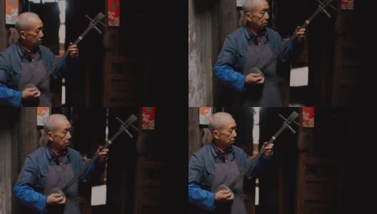 弹长颈琵琶的中国老人高清在线视频素材下载