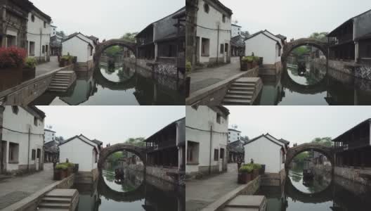 这条运河穿过中国江苏省的古镇高清在线视频素材下载