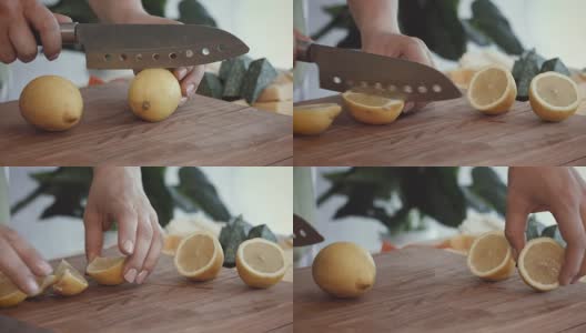 女性的手在切菜板上切新鲜的柠檬高清在线视频素材下载