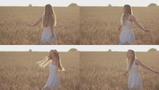 日落时分，田野里一个头发飘逸的可爱女人高清在线视频素材下载