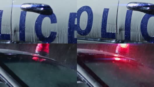 警灯对警车闪烁。警察包围。RED EPIC电影摄影机慢动作拍摄。高清在线视频素材下载