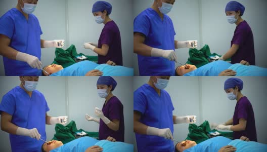 4K:外科医生在现代手术室为病人准备手术。高清在线视频素材下载