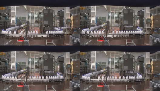乌克兰一家现代乳制品工厂的奶瓶生产线高清在线视频素材下载