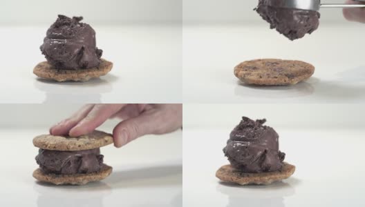 近距离拍摄的巧克力冰淇淋勺在巧克力片饼干三明治高清在线视频素材下载