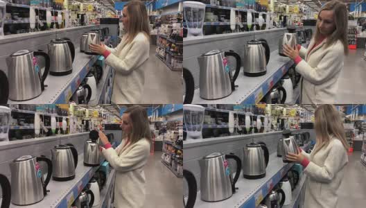一名年轻女子在一家家居用品商店挑选一个水壶高清在线视频素材下载