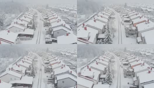 汽车在下雪的郊区行驶，邻居在清理车上的积雪高清在线视频素材下载