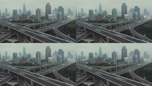 天桥和城市交通高峰时段的全景鸟瞰图，从白天到晚上/上海，中国高清在线视频素材下载