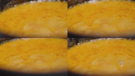 沸腾的奶酪火锅缓慢旋转。高清在线视频素材下载
