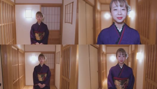 穿着Furisode和服的年轻女子走在日本旅馆的走廊上高清在线视频素材下载