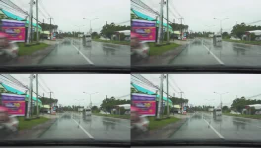 时间推移和时间扭曲驾驶在道路上。雨落在POV前视图的汽车。雨点落在汽车挡风玻璃上。高清在线视频素材下载