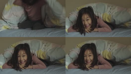 混血亚洲女孩在她的卧室玩躲猫猫高清在线视频素材下载
