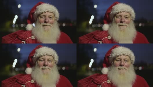 黄昏时欢快的圣诞老人在户外的大头照高清在线视频素材下载