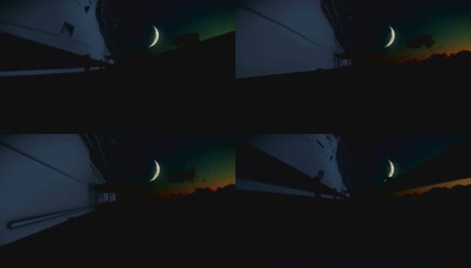 等待乘客上船的游轮，日出满月高清在线视频素材下载