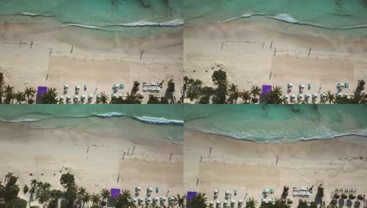 在加勒比海清澈的海水沙滩上爆发的波浪。高清在线视频素材下载