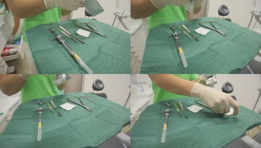 牙科诊所牙科助理准备牙科治疗所需的工具高清在线视频素材下载