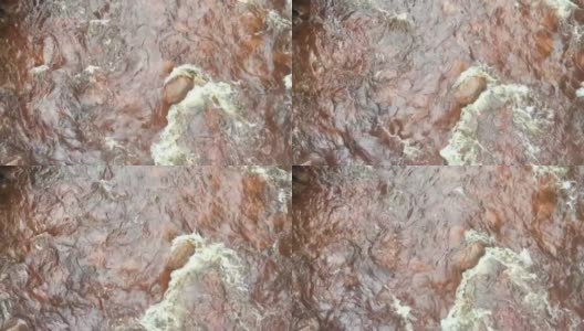 澳大利亚塔斯马尼亚州昆斯敦的国王河河水流过岩石高清在线视频素材下载