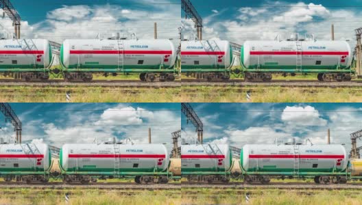 用铁路运输的一组火车油罐和燃料。2019年6月，哈萨克斯坦努尔苏丹阿拉木图。间隔拍摄4 k高清在线视频素材下载