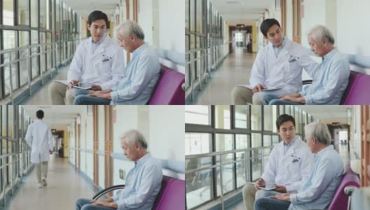 年轻的亚洲医生与年长的亚洲病人交谈高清在线视频素材下载