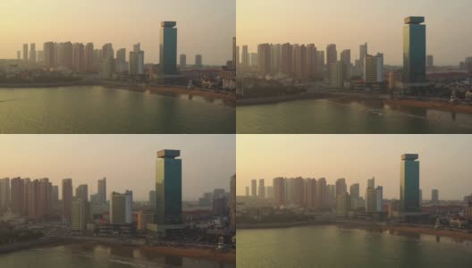 日落天空青岛城市海滩交通城市海湾航拍全景4k中国高清在线视频素材下载