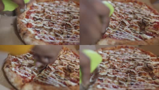 用披萨刀切披萨高清在线视频素材下载