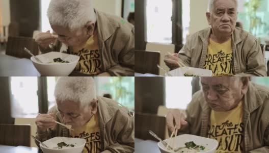 爷爷正在吃面条高清在线视频素材下载