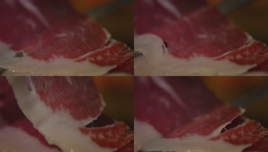 慢镜头西班牙人切伊比利亚火腿菜，传统的跨菜高清在线视频素材下载