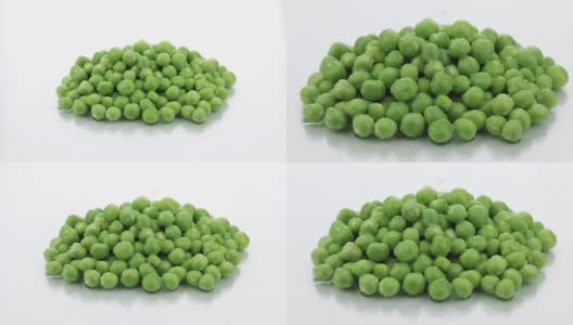 一堆熟透的、新鲜的绿豌豆在露珠中噼啪作响高清在线视频素材下载