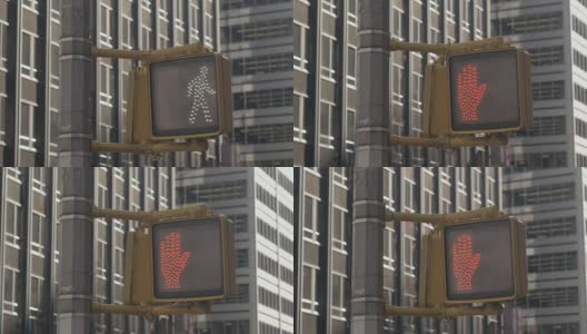 近景:人行横道灯从行人标志转向红色手高清在线视频素材下载